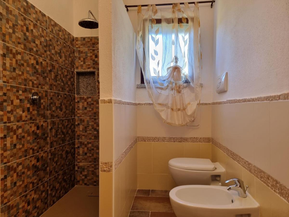 Le Residenze Di Baia Sant'Anna Villa Tanaunella Exterior photo
